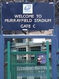 Rugby Guy climbing over the gate while nobody is watching