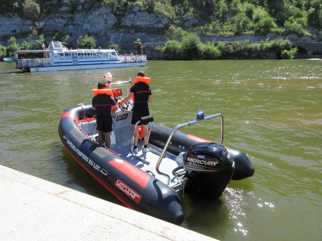 firemen on boat achors